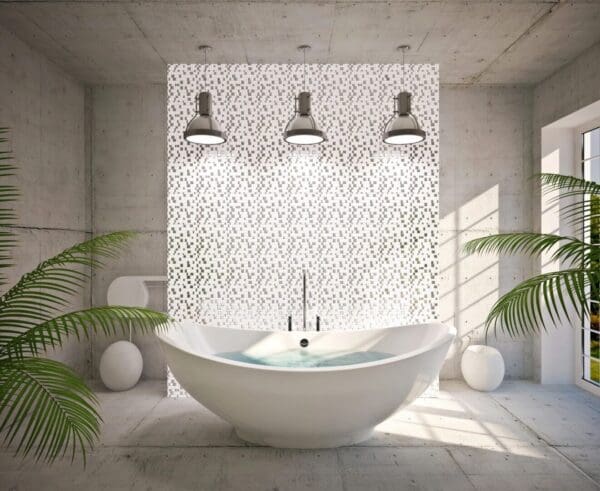 A white bathroom with a bathtub and plants.